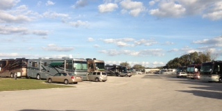Campground of motorhomes waiting for service