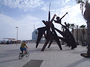 Riding a Bicycle in Barcelona (bike barcelona beach sculpture)