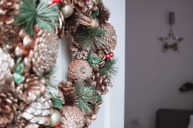 Wooden Christmas wreath on a door