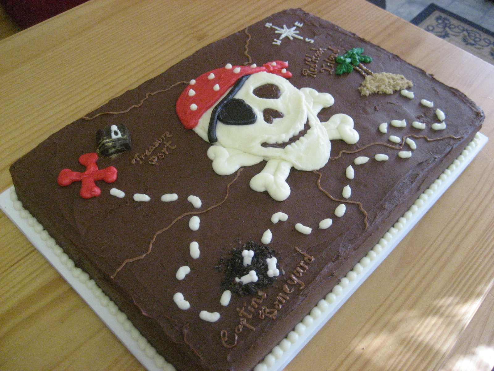 halloween wedding cake toppers Fun pirate-themed treasure map cake for a birthday.