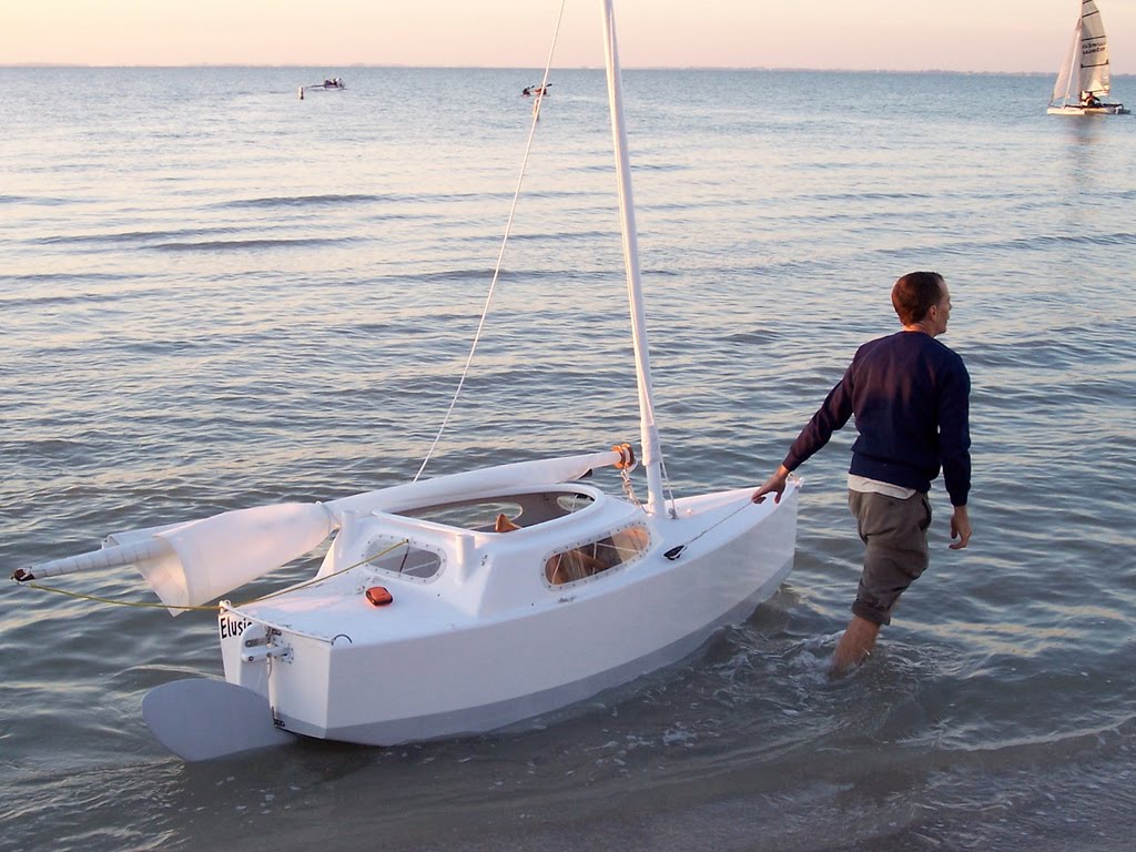 Tell a Elusion sailboat plans :Sailing
