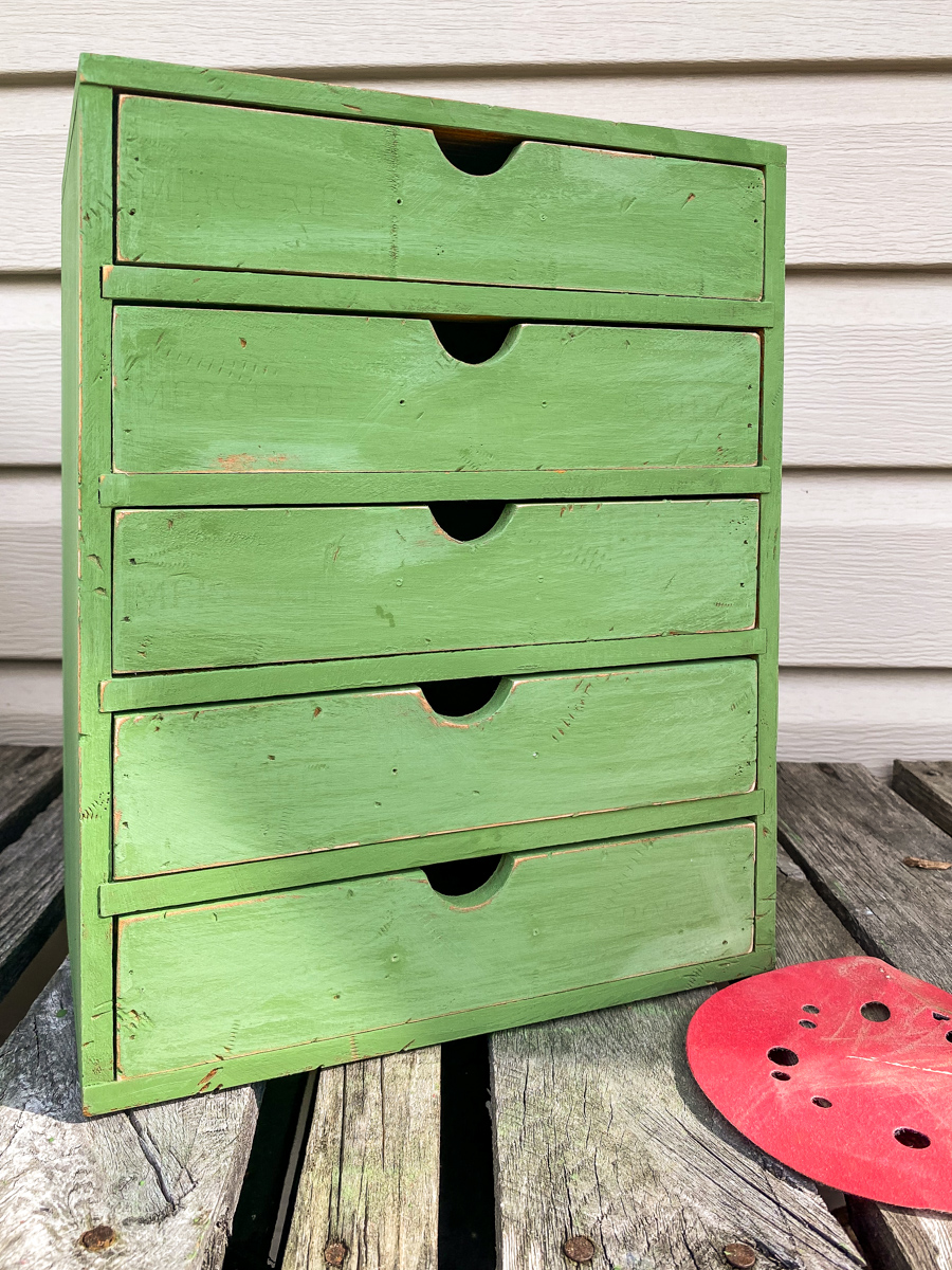 Distressing paint on storage drawers