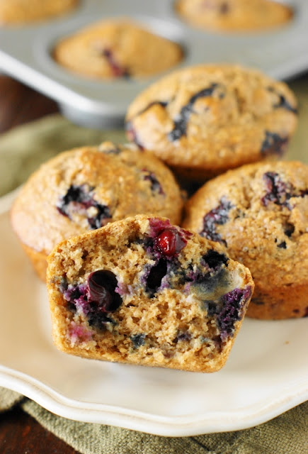 Blueberry Oatmeal Muffins ~ Made with ground oats, whole wheat flour, and just a touch of white flour, these tasty muffins are mostly whole grain.  They make a perfect low-guilt breakfast or after-school snack!   www.thekitchenismyplayground.com