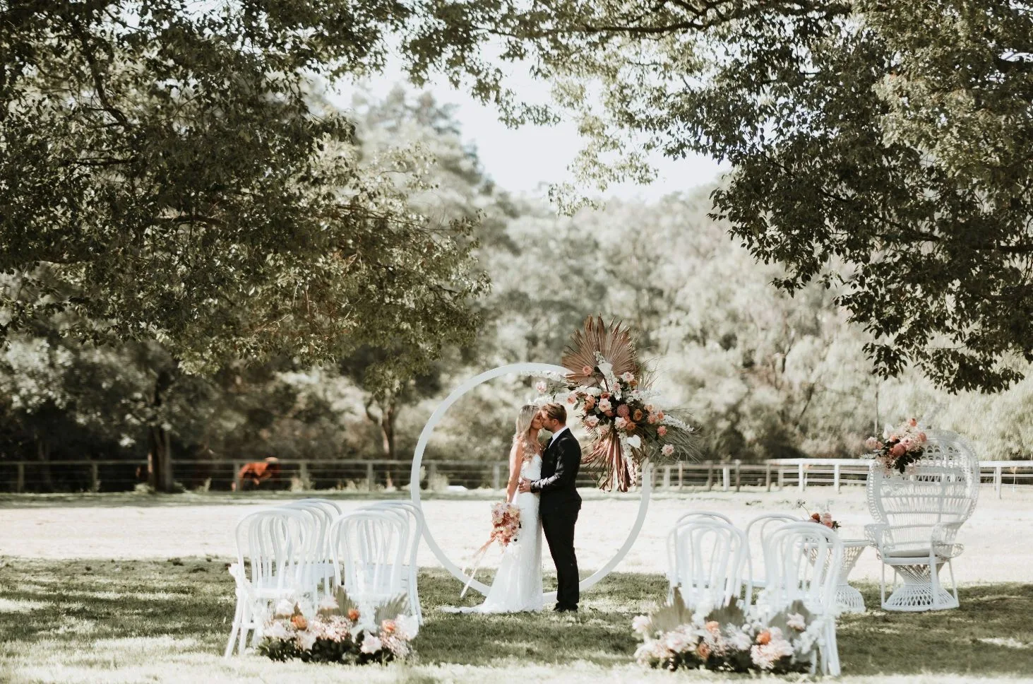 barefoot and soul photography balloon garand neon sign florals bridal gowns