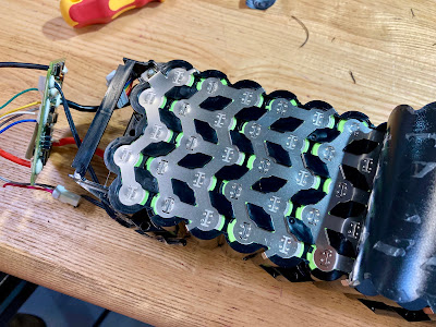 Inside the battery pack showing the construction of (some of the) 13 rows in series with 5 cells in parallel (13s5p)