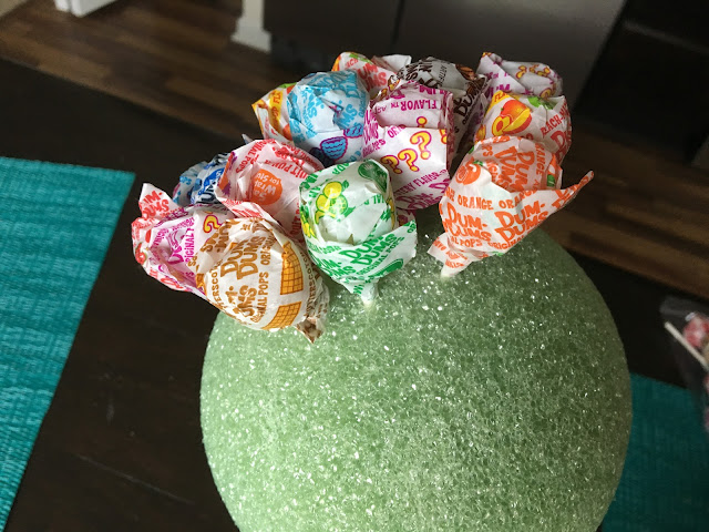 stick dum dums into foam ball