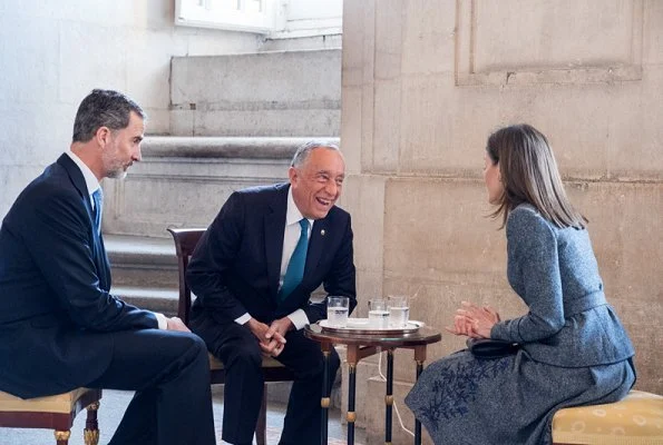 Queen Letizia wore Felipe Varela skirtsuit, and Magrit Pumps and carried Magrit clutch bag. Queen Letizia will hold a gala dinner at Royal Palace