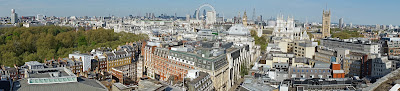 View from 55 Broadway, showing the trees of St James's Park to the left, the London Eye in the centre, and the Houses of Parliament to the right.