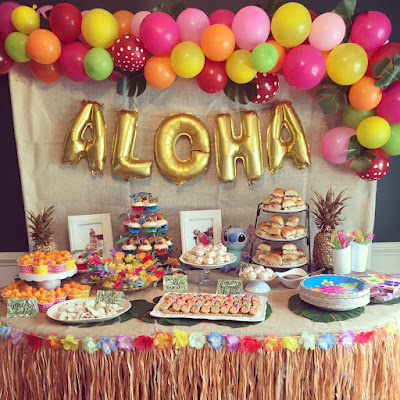 Lilo and Stitch theme birthday party - How to throw a Lilo and Stitch inspired Hawaiian Luau. Food and drink table decoration ideas.