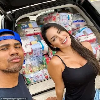 Juventus star Douglas Costa and his girlfriend help those in need in Brazil