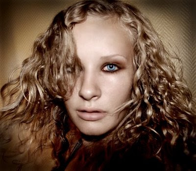 crimped hairstyle. hairstyle has been crimped