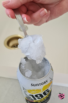 Suntory 196 Double Lemon Vodka drink alcohol can opened with frozen slushie and spoon over kitchen sink at home alcohol recipe summer hack