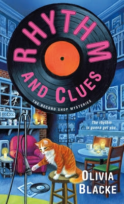book cover of cozy mystery Rhythm and Clues by Olivia Blacke