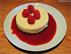 Vanilla Bean Cheesecake with Raspberry Sauce