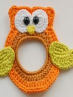 http://www.ravelry.com/patterns/library/owl-the-lens-buddy