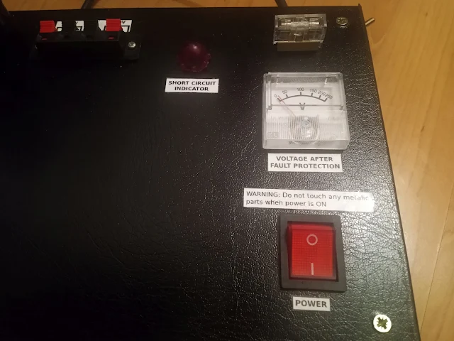 Mains short circuit protection, current limiter using incandescent light bulb in series 3