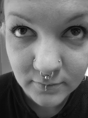 Septum Piercing with two Nostril Piercings 