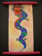 . their dragons with marker and used chalk to make colorful backgrounds. (picture )