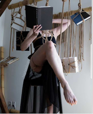 dominatrix librarian bondage shibari books