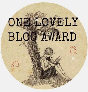 http://lanaciondelibros.blogspot.com/2015/02/one-lovely-blog-award.html