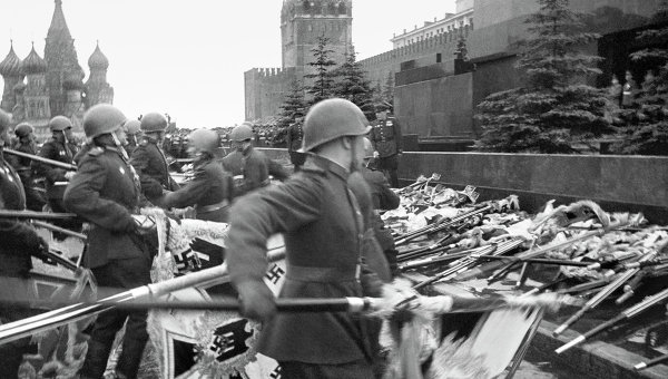 The parade ended with a march of 200 standard-bearers who flung the banners of defeated German troops to the platform at the foot of the Mausoleum