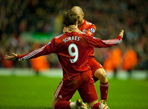 LIVERPOOL, ENGLAND - Sunday, November 7, 2010: Liverpool's Fernando Torres celebrates scoring his second goal against Chelsea with team-mate Raul Meireles during the Premiership match at Anfield. (Photo by David Rawcliffe/Propaganda)