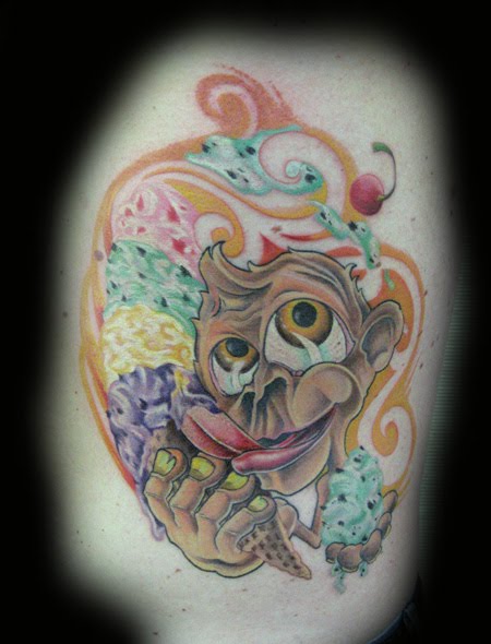 Cartoon monkey with ice cream tattoo.