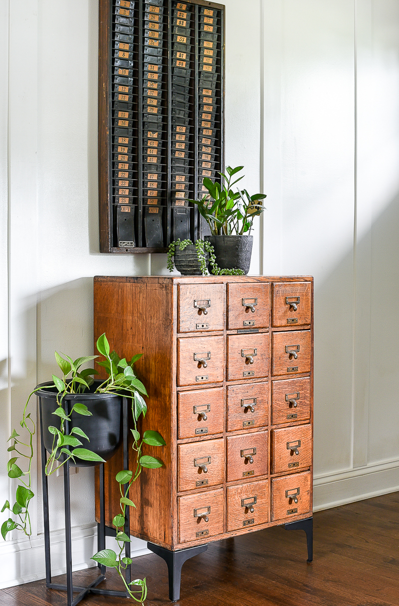 Metal legs added to antique oak card catalog