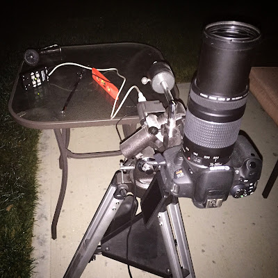 canon DSLR on motor tripod mount