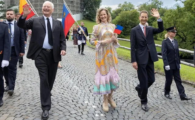 Princess Sophie wore a Lola paisley midi dress by Zimmermann. Princess Marie-Caroline wore a green top and skirt by Kenzo