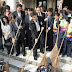 PM Abhisit sweeps up his office after busy SMS day