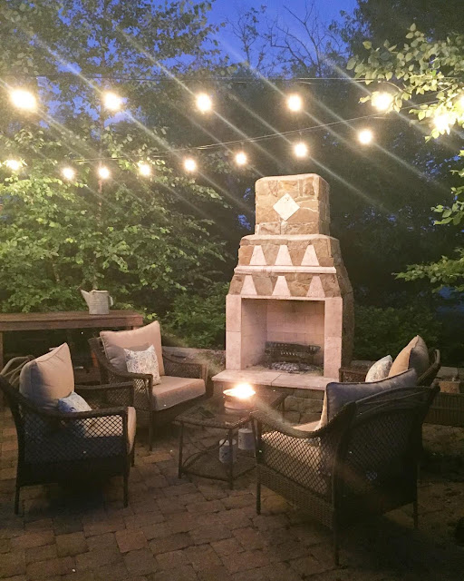 Paver patio with stone fireplace 