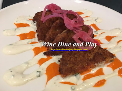 The fried green tomato appetizer at The Cafe At Mise En Place inside the Tampa Airport, Florida