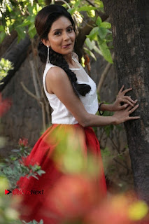 Actress Mahima Nambiar Latest Stills in White Top and Red Skirt at Kuttram 23 Movie Press Meet  0020.jpg
