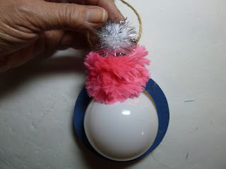 Recycled light bulb ornament for breast cancer awareness