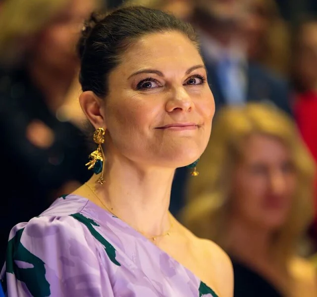 Crown Princess Victoria wore a Paris red suit by The Extreme Collection. Cravingfor earrings. By Malina Anya dress