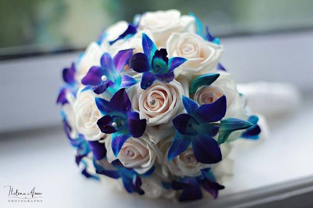 cream roses and blue flowers bridal bouquet