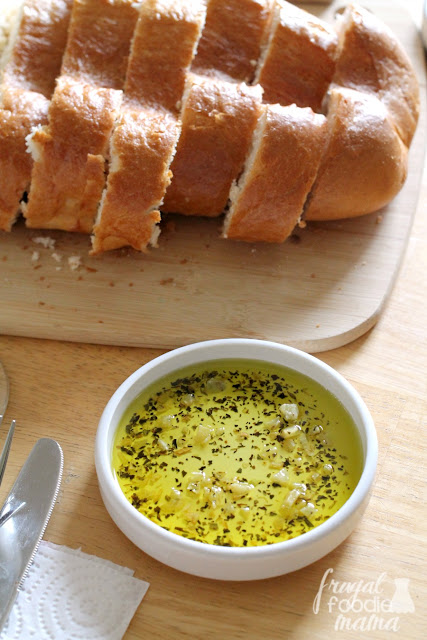 Whip up a flavorful Italian dipping oil for bread in just minutes! The perfect addition to a Tuscan Inspired Sunday Dinner. #BertollDinnerParty #spon