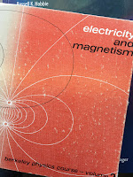 Electricity and Magnetism, by Edward Purcell, superimposed on Intermediate Physics for Medicine and Biology.