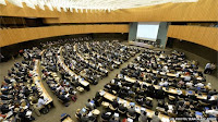 Work is continuing on text aimed at a new climate change agreement by the end of the year (Photo Credit: UN / Jean Marc Ferré) Click to Enlarge.