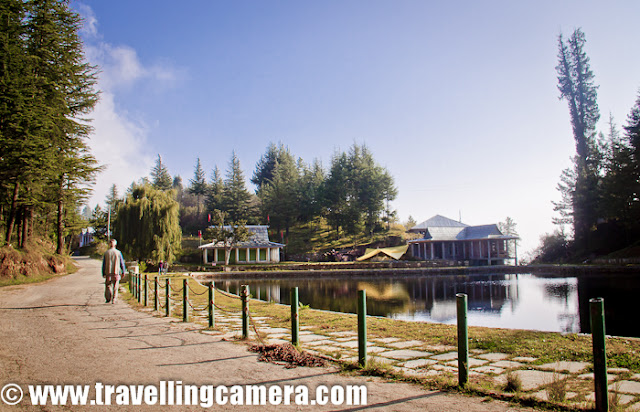 The Tani Jubber Lake is placed among the scenic  surroundings of Thanedar nearly 4 kilometers. Here is a quick Photo Journey to the real place in Himalayas !!!Thanedar has a very special place in the history of Himachal Pradesh, INDIA. The first apple sapling was planted here in Kotagarh near Thanedar... Kotgarh is 15 km. from Narkanda which is a famous hill station for its Apple, Apricot Orchards that are found all over the area. During this trip we also enjoyed fresh Apples and Apricots from Kotgarh... One of our friend borough all that stuff from his home in kotgarh !!! The beautiful Tani Jubber lake lies between the snow-covered mountains in the backdrop of lusting greenery and apple orchards... Soon I will be sharing some photographs from a Orchard-house where we stayed at Tani Jubber !!!Tani Jubber is mainly surrounded by high cedars but   surrounding village overlooks the enchanting valleys and on a clear day Himalayan snow peaks as well are visible. The place is surrounded by dense forests and is very picturesque in appearance.Tani Jubber Lake is the home for many kinds of birds. During winters one can see very colorful birds in different shapes and sizes...The lakeside is famous for the Nag-Devta temple in Thanedar, where many devotees offer their prayers to the serpent god.There is another local temple on the side of the lake, which is open to only locals... A fair takes place at the lakeshore during the month of June, which attracts many people... Local artisans and craftsmen display their products and artisan mastery during this fair...There are many places around Tani Jubber lake where tents can be installed to enjoy wild nights of Himalyas :) ... There is a government school near Tani Jubber lake with a huge ground and many times various adventurous groups take appropriate permissions to install there tents during the night and  clean up the space before school starts...An old man walking around Tani Jubber Lake near Thanedar, Shimla, Himachal Pradesh... During the visit to Tani Jubber, Mr. Pawan Khimta was accompanying us Naturally beautiful Tni Jubber Lake is a good place to have a visit. This is not a very popular place on Tourist map of Himachal but there is no doubt about it's beauty.  Lake is small but surroundings are amazing and worth a visit...Tani Jubber Lake can be visited throughout the  year. However, temperatures vary with the seasons. April - November are pleasant days (light woollens would work) and cold nights. December to March mainly get snow and minimum temperatures touch zero degrees Celsius...