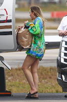 Miley Cyrus Sexy legs in Green Shirt Dress