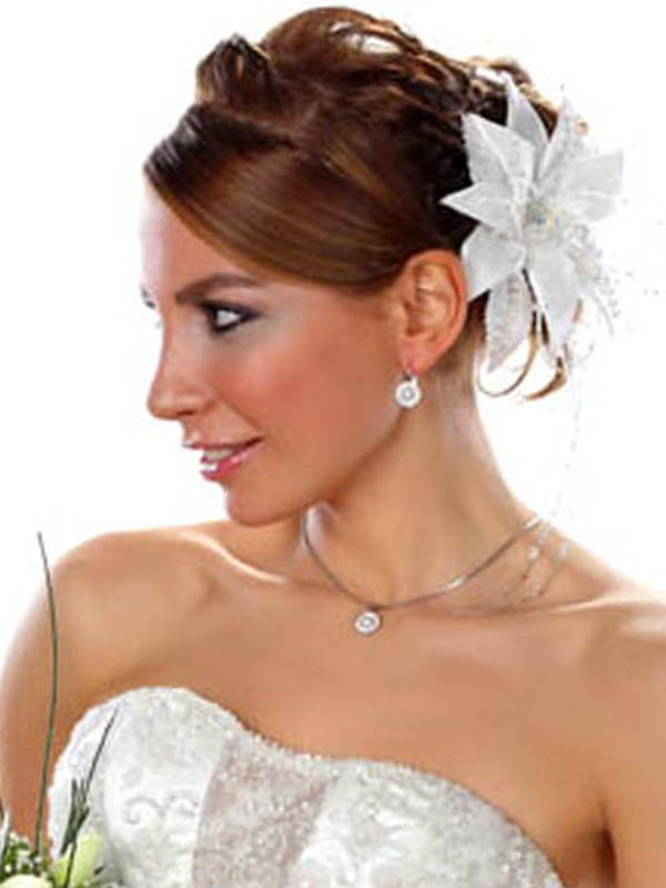 wedding updos with flower hair accessories