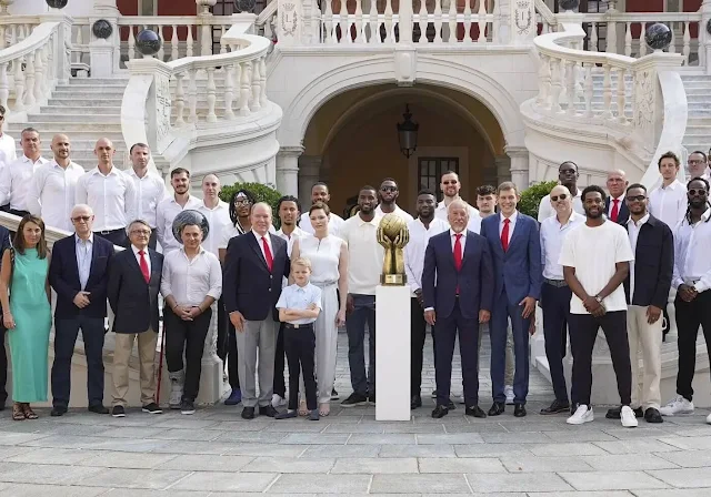 Giorgio Armani Wide-leg Marocain silk trousers. Princess Charlene wore a Marocain silk top by Giorgio Armani