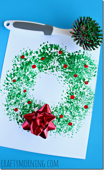 Oh so CLEVER Christmas Wreath Painting - This is such a fun out-of-the-box way to paint a Christmas wreath that produces a beautiful Christmas Craft or Kids! Great for toddler, preschool, kindergarten, 1st grade, and more.