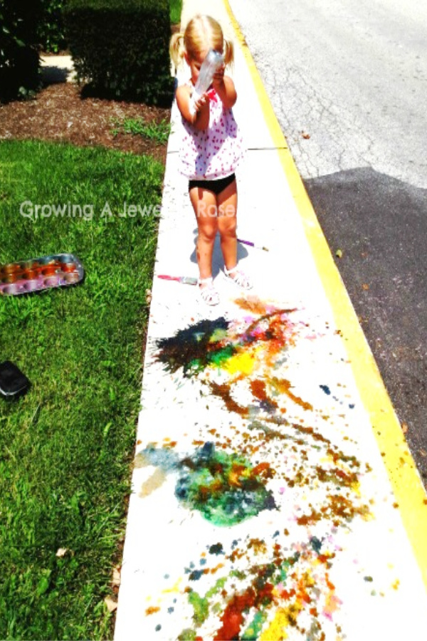 Paint the town this summer with fizzing sidewalk paint!  This easy recipe will keep the kids playing for hours! ##chalkpaintrecipe #sidewalkchalkart #sidewalkchalk #sidewalkchalkideas #chalkart #chalkpaint #chalkrecipe #chalkrecipesforkids #growingajeweledrose