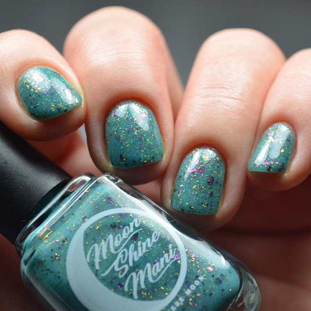 teal nail polish with flakies four finger swatch low light