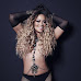 Fans accuse Mariah Carey of photo-shopping her topless photos for Paper magazine