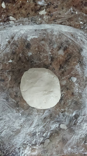 a piece of dough made into a ball