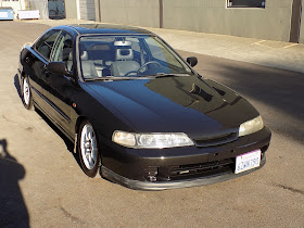 Integra with peeling paint after overall paint job at Almost Everything Auto Body.